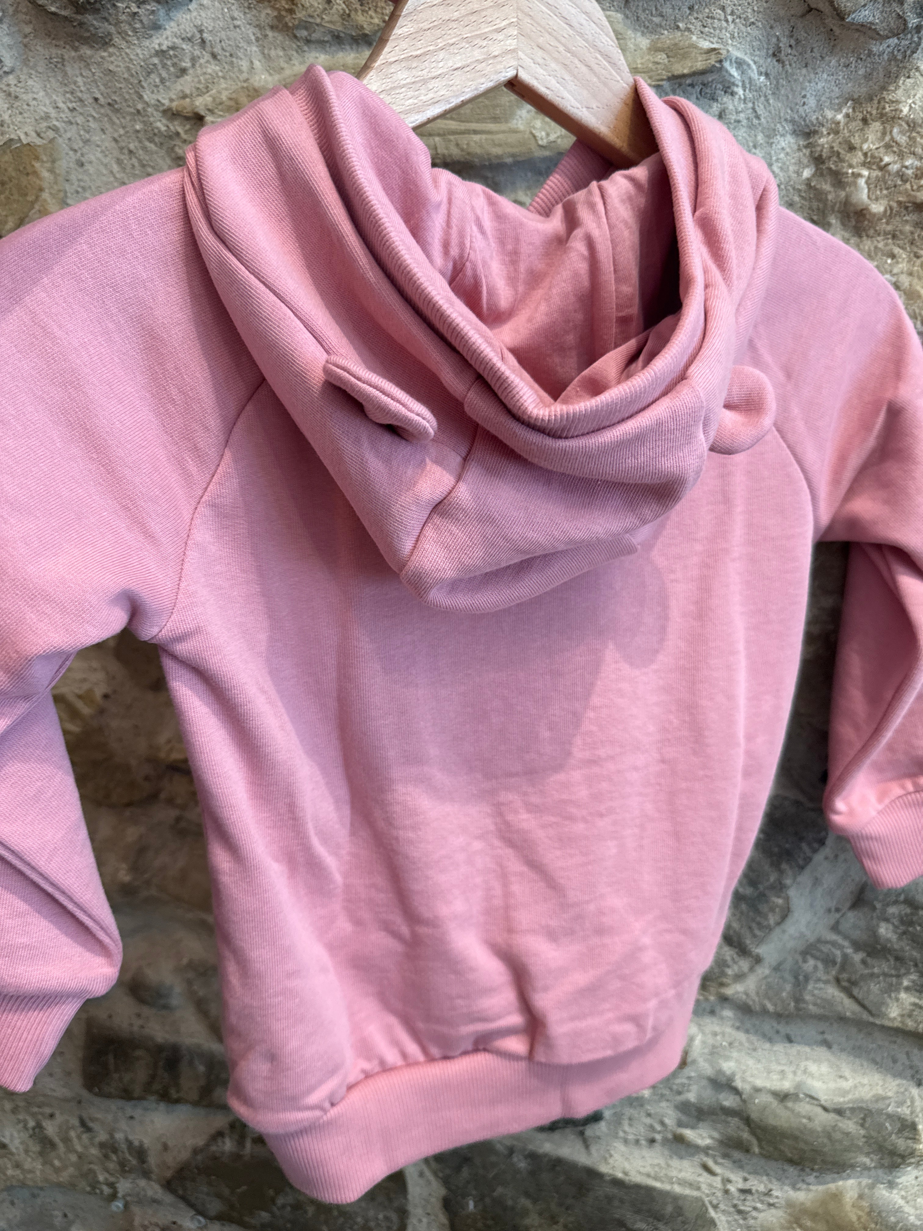 Felpa con fiori e orecchiette