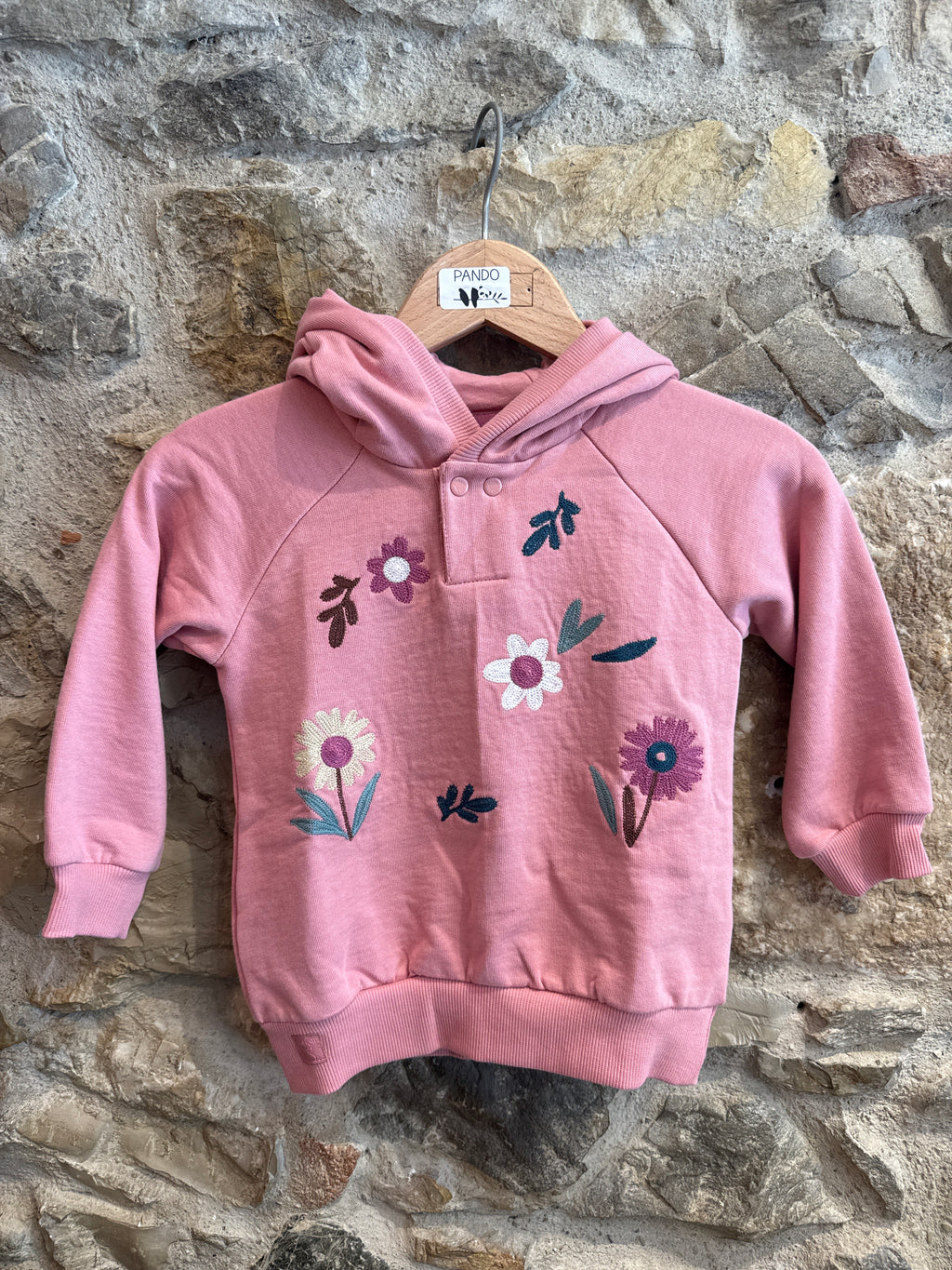 Felpa con fiori e orecchiette