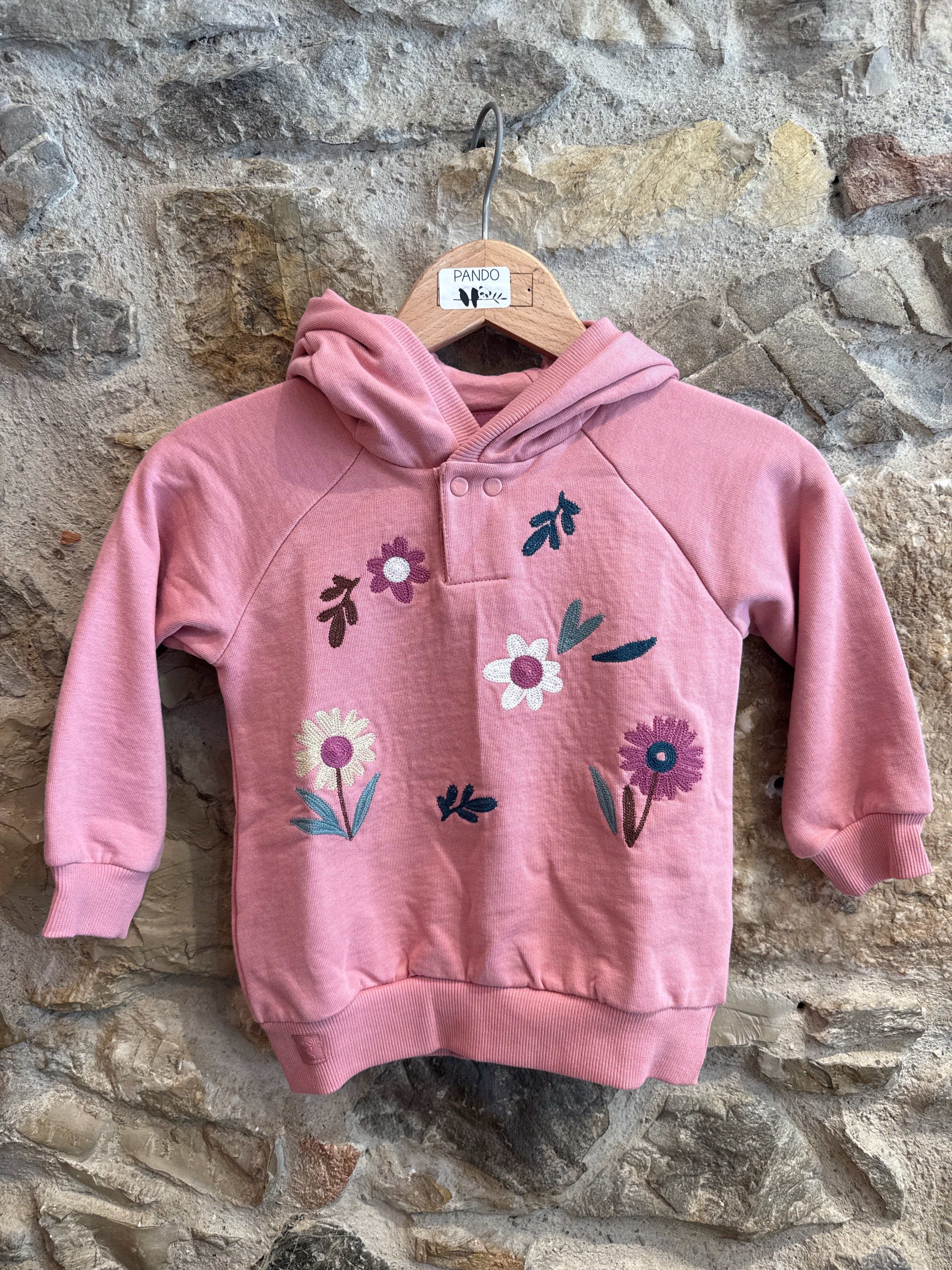 Felpa con fiori e orecchiette