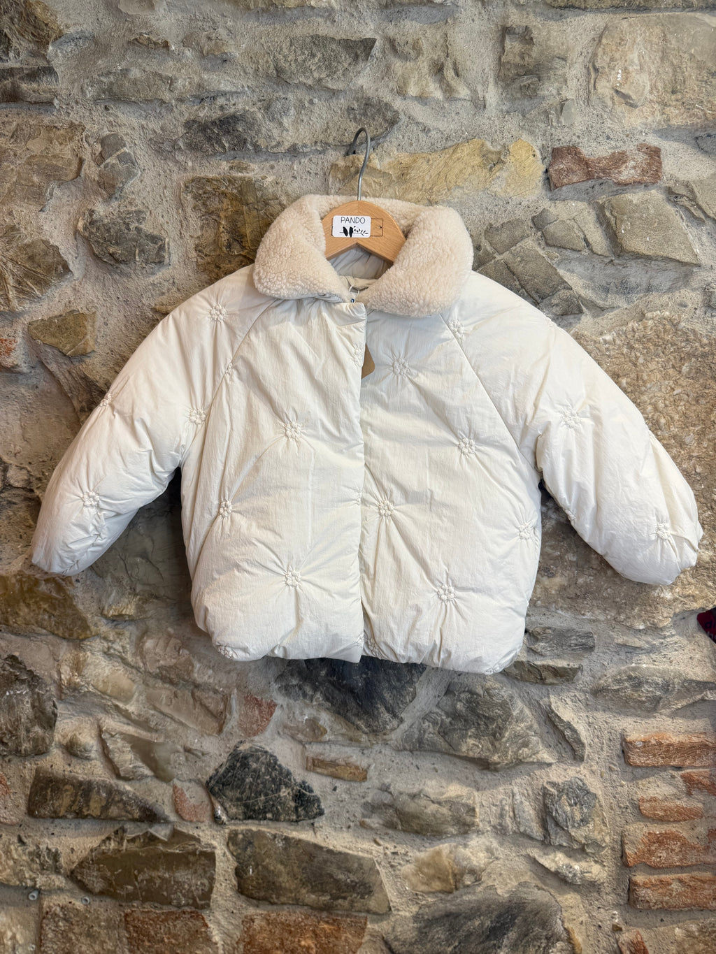 Piumino con collo in pelliccia