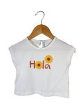 🌼 T-shirt bambina con ricamo floreale “Hola”