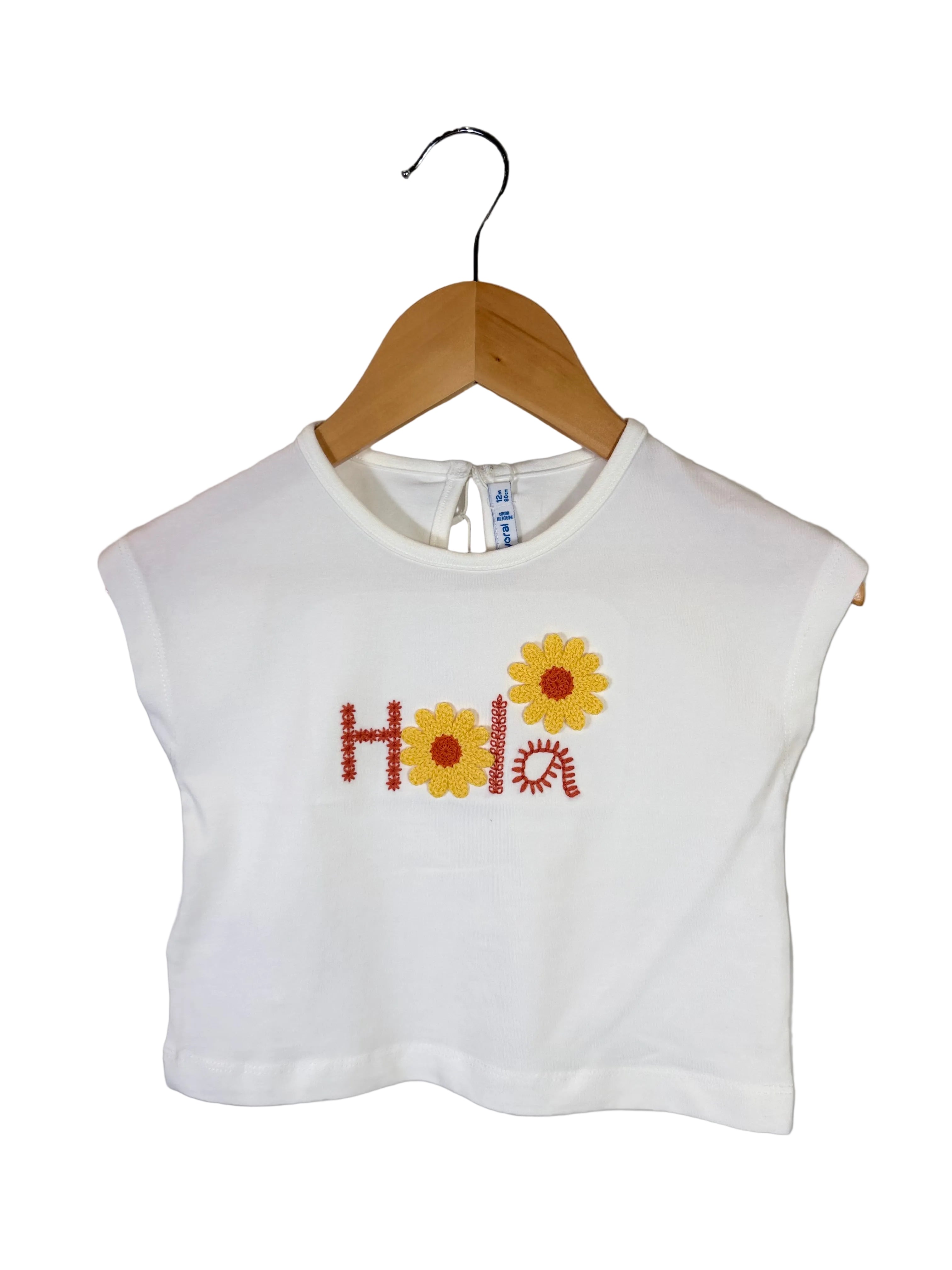 🌼 T-shirt bambina con ricamo floreale “Hola”