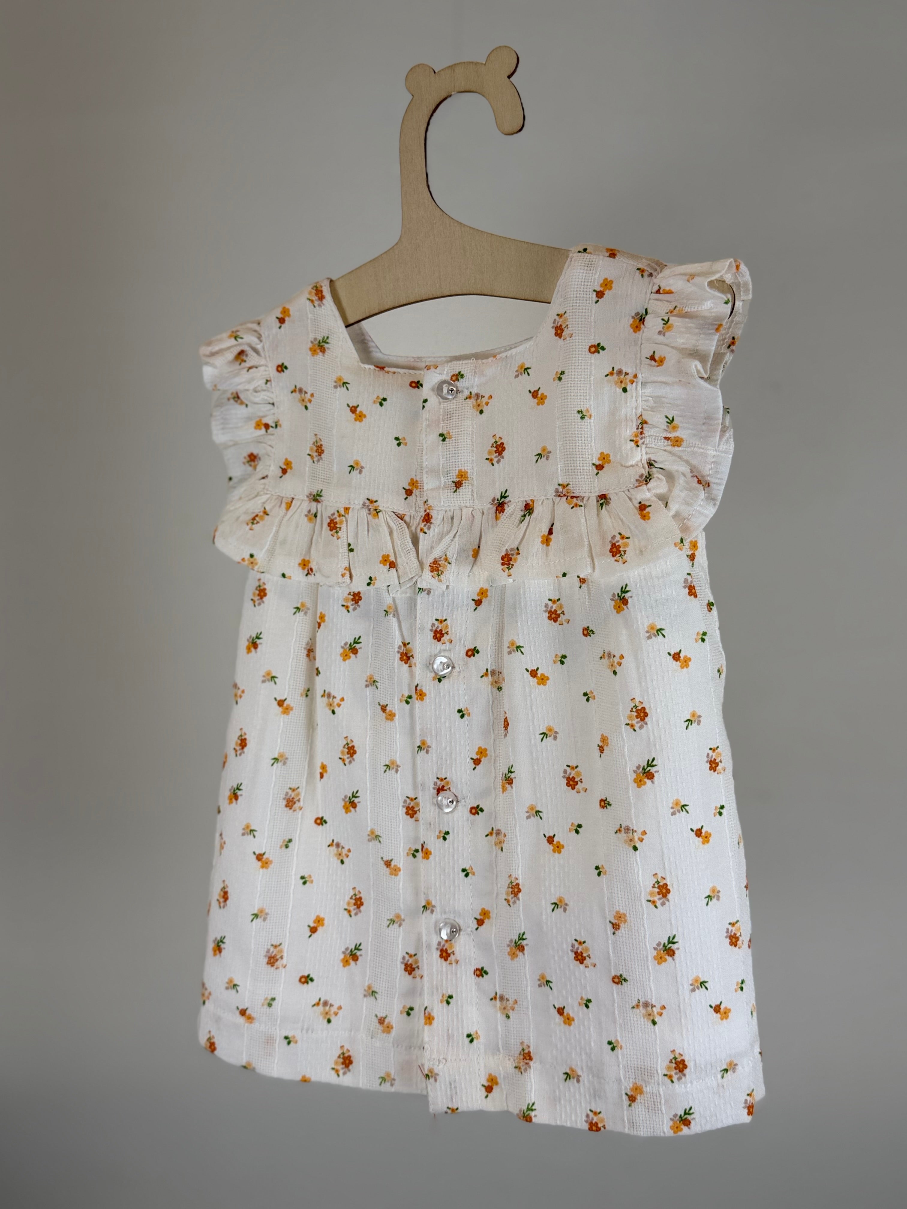 🌼 Blusa neonata con stampa floreale