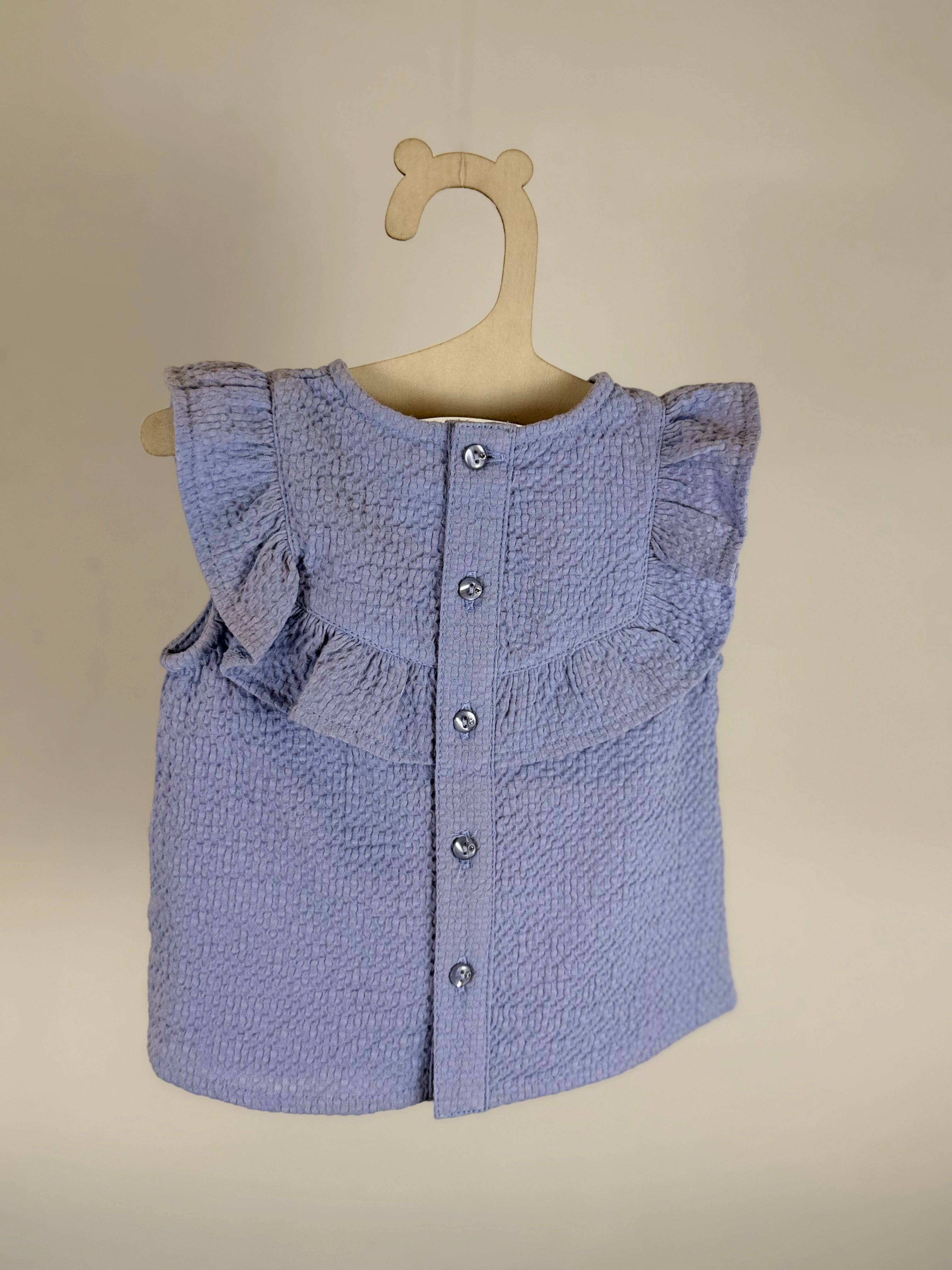 💙 Blusa neonata con volant azzurra