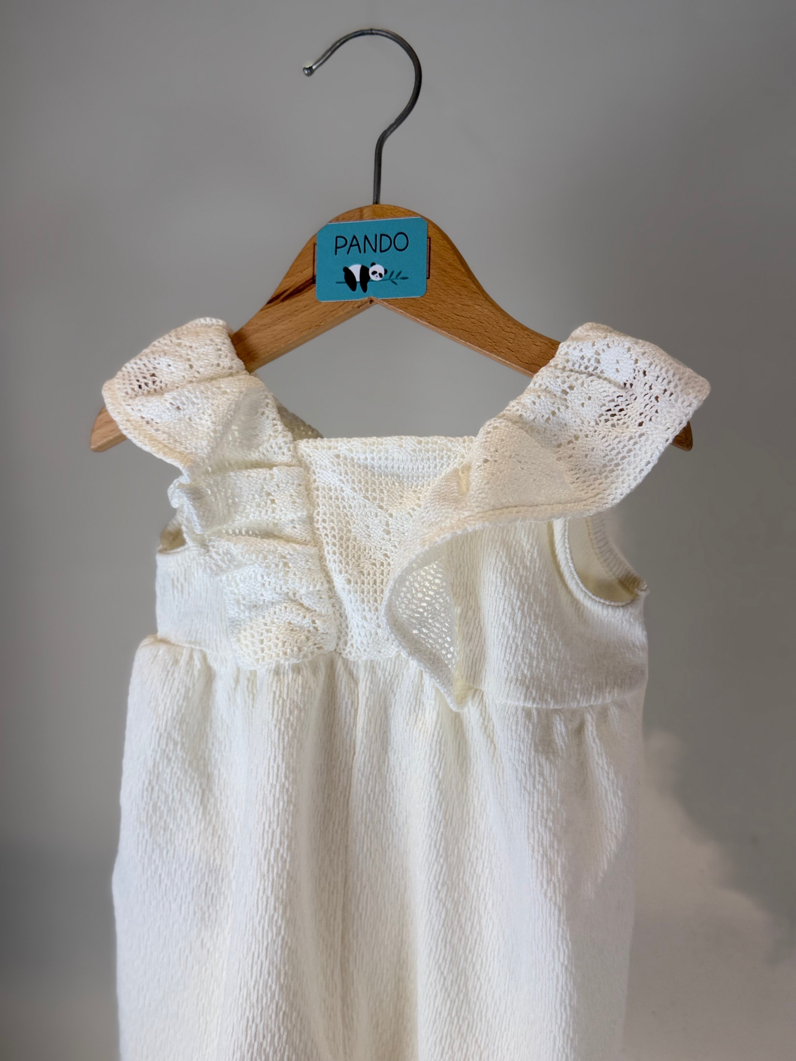 Tutina Neonata con Volant in Maglia “Pure Elegance”