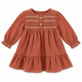 Vestito terracotta con ricami e balza